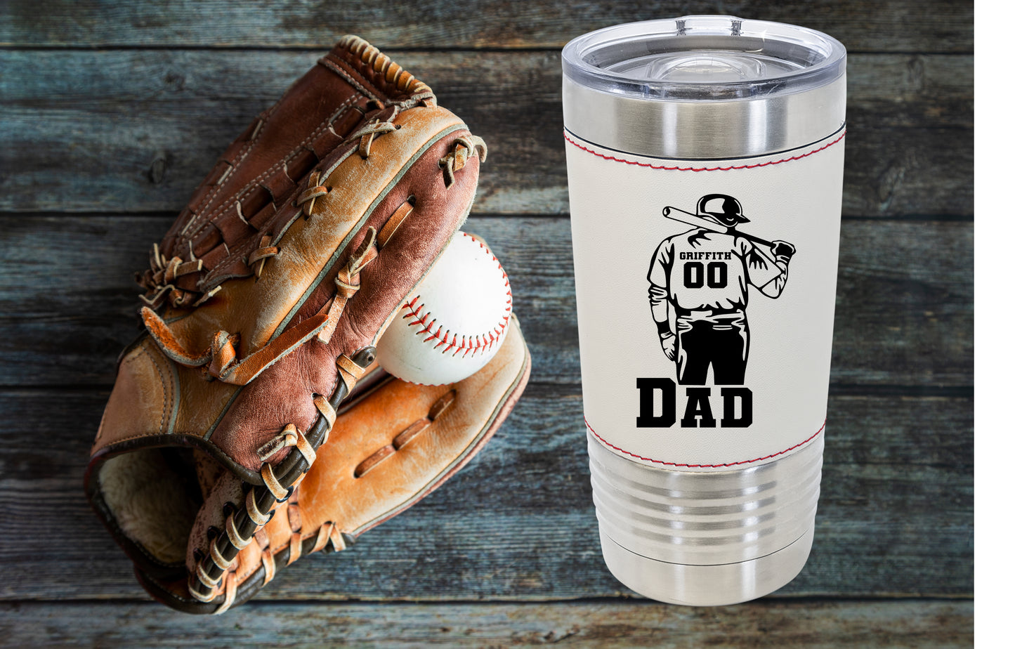 20 oz tumbler baseball leather tumbler with ball player holding a bat with custom name and number with Dad under in block letters front view-Stack Life Customs
