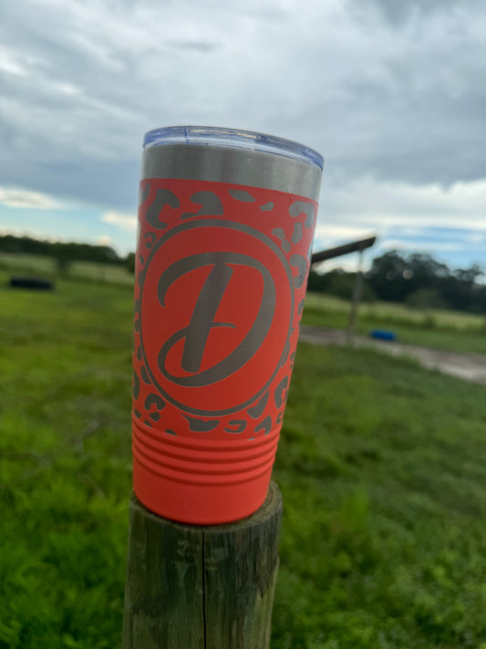 20 OZ CORAL TUMBLER WITH LEOPARD PRINT ALL THE WAY AROUND FRONT VIEW WITH A SCRIPT D